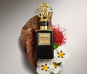 Parfum Roberto Cavalli Gold Collection cu accente florale în flacon negru cu detalii aurii